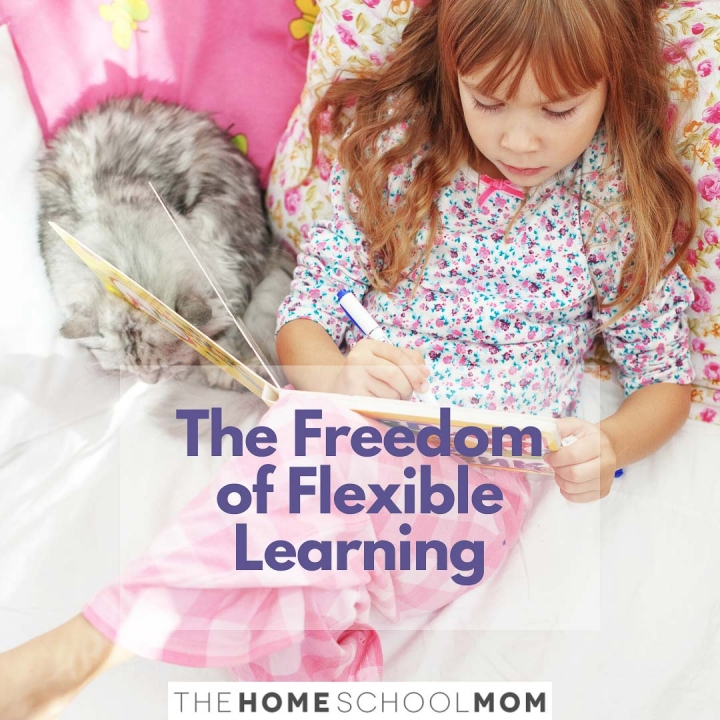 child lying on a bed coloring in a book next to a cat with text The Freedom of Flexible Learning - TheHOmeSchoolMom