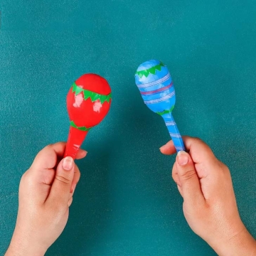 DIY maracas made from plastic spoons.